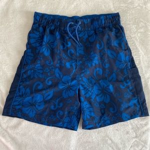 Blue and navy hibiscus print swimming trunks